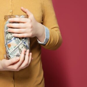 Women Holding Money Jar at her belly